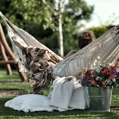 Photo by whamaku.pl on April 07, 2026. May be an image of towel, macrame, hammock, deck chair and outdoors.